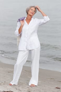 Active senior woman on the beach
