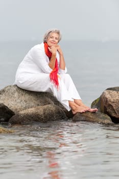 Active senior woman on the beach