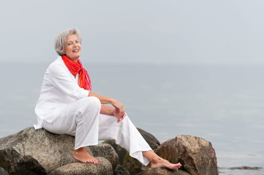Active senior woman on the beach