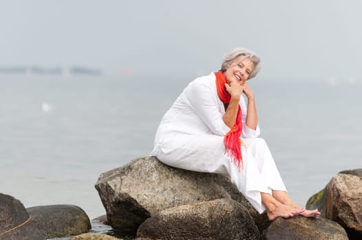 Active senior woman on the beach