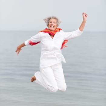 Active senior woman on the beach