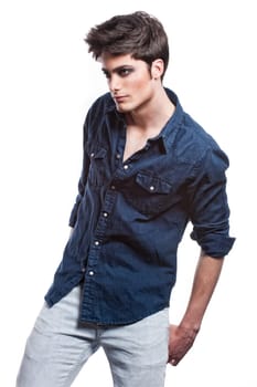Fashion shot of a young man in the studio
