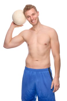 Studio shot of a young volleyball player against a white background