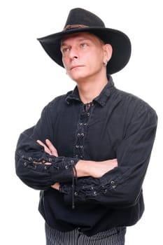 Man in western outfit against white background in studio