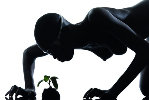 one beautiful black african naked woman protecting nature in studio isolated on white background