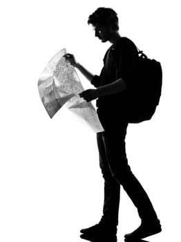 young man silhouette in studio isolated on white background