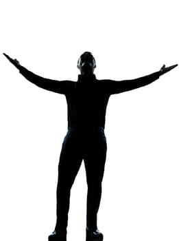 one caucasian business man happy arms outstretched silhouette Full length in studio isolated on white background