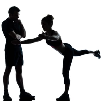 couple woman man exercising workout fitness aerobics posture in silhouette studio isolated on white background