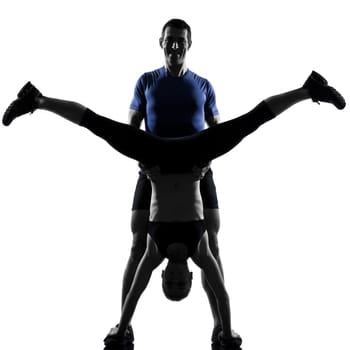 couple woman man exercising workout fitness aerobics posture in silhouette studio isolated on white background
