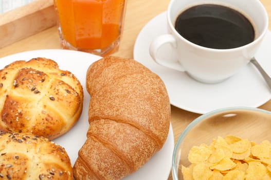 Breakfast in Bed - Corn Flakes, Coffee, Croissant, Orange Juice, Coffee and Rolls