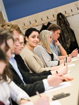 Smiling woman in the classroom