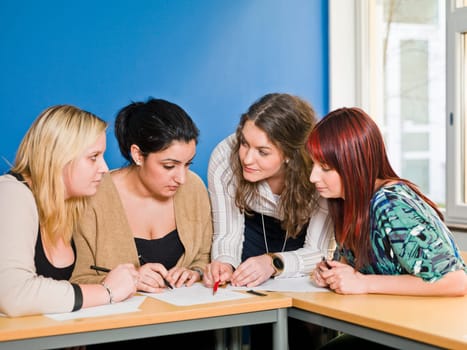 Four girls groupwork in the classroom