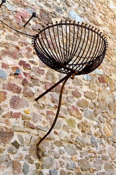 Medieval lamp at the entrance of a Tower in Tossa de Mar, Spain.