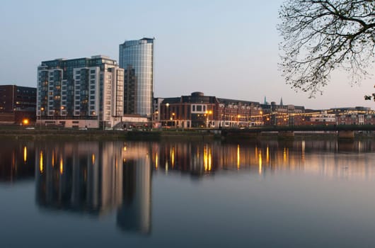 stunning nightscene with Riverpoint buildings and Shannon bridge (over Shannon river) in Limerick, Ireland (picture taken after sunset)