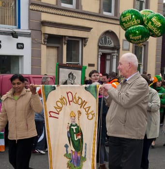 MALLOW, IRELAND - MARCH 17: unidentified people perform at the St. Patrick&#039 s day on March 17, 2012 in Mallow, Ireland. This national Irish holiday takes place annually in March, event was held during the afernoon of March 17th 2012.
