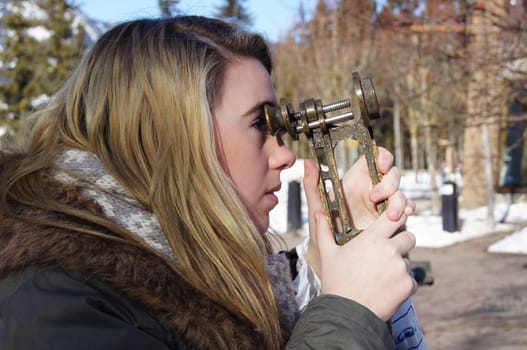 Girl Looking Through Binoculars