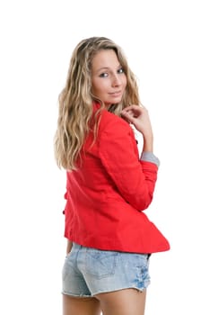 Woman in short jeans and red jacket on white