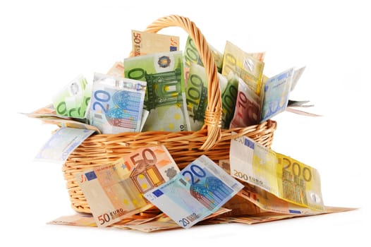 Composition with Euro banknotes in wicker basket. European Union currency