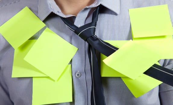 Businessman with plenty of post it notes