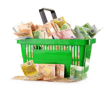Composition with Euro banknotes in shopping basket. European Union currency