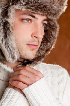 autumn winter man with brown fur  hat portrait