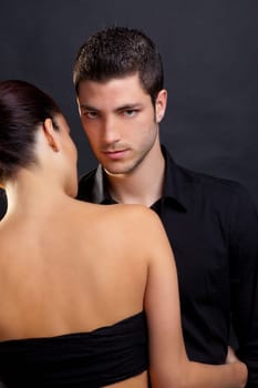 Couple in love with handsome man and rear profile woman nude back