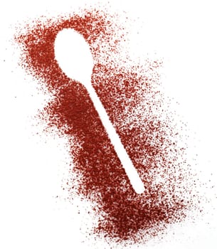 Crisp white shape of a spoon in randomly scattered cocoa or chocolate powder