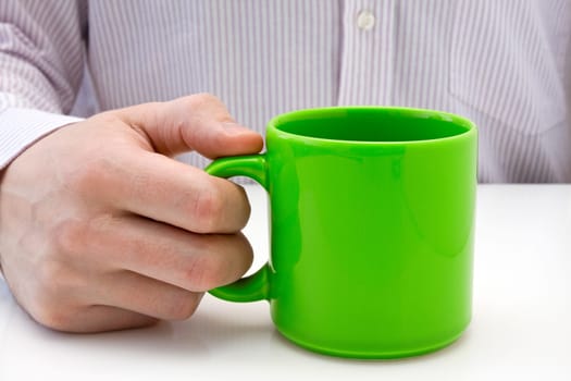 businessman hold a green cup of tea