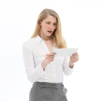 Young woman looking at an envelope in surprise and horror against a white background -Square