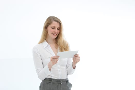 Young woman receives good news. She looks at a letter clipping with text space