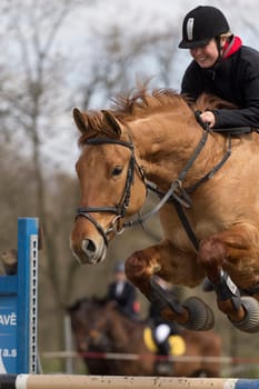 TRESTINA - APRIL 09: Unidentified rider in action at "Jump equestrian facilities"" on April 09, 2011 in Trestina (Czech Republic)"