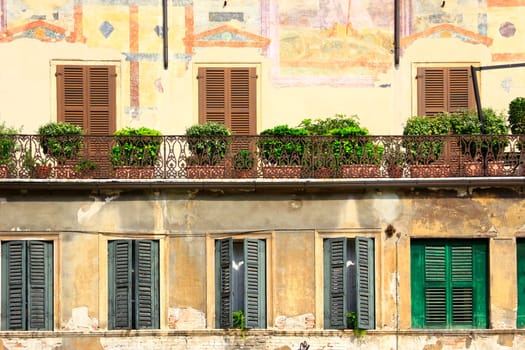 picturesque,painted facades at Piazza delle Erbe,Verona,Italy
