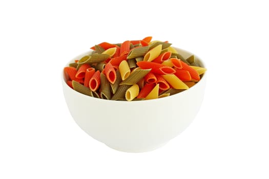 Raw colored pasta in white bowl isolated on white background