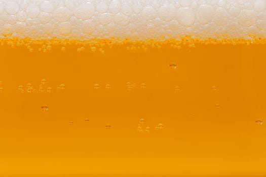 cold beer,close-up with foam and bubbles