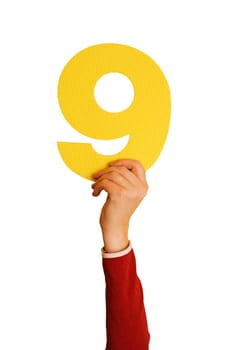 number nine in hand,isolated on white background