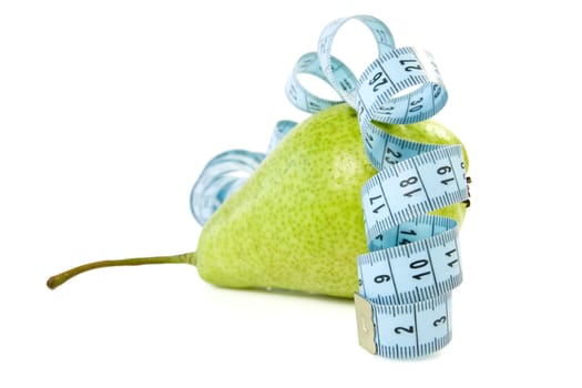 green pear wrapped by blue measure tape