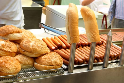 Heap of hot dogs and buns  ready for eating