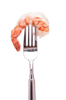 Fried shrimp on a fork and against a white background