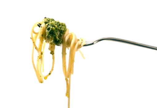 Fork with spaghetti al pesto