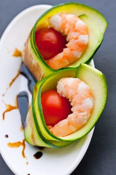 Appetizer with zucchini, shrimp and tomatoes