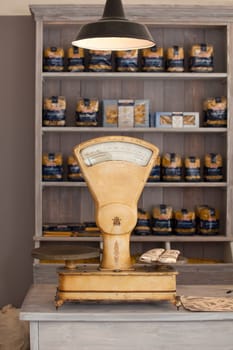 Vintage kitchen scales, Italian pasta on the background