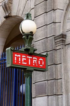 Red and green metro sign in Paris France