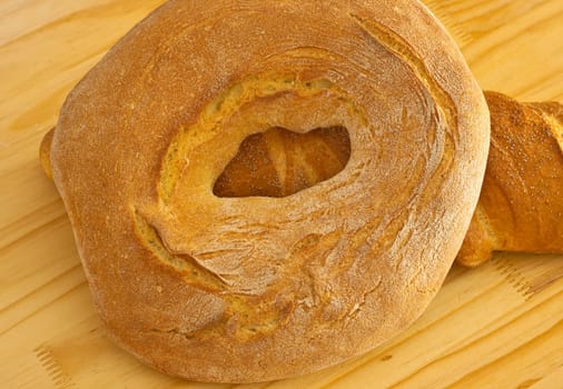 Bread on wooden background