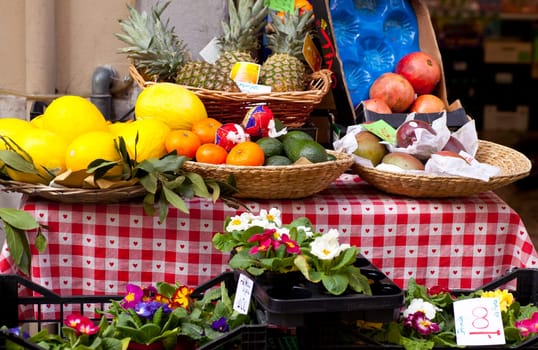 Fruits on wicker basket in the fruits stand