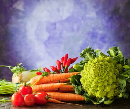 Vegetables on purple background