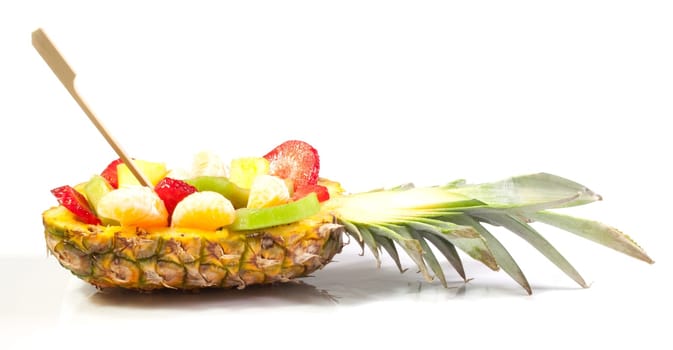 Fruit salad inside a pineapple