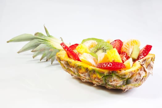 Fruit salad inside a pineapple