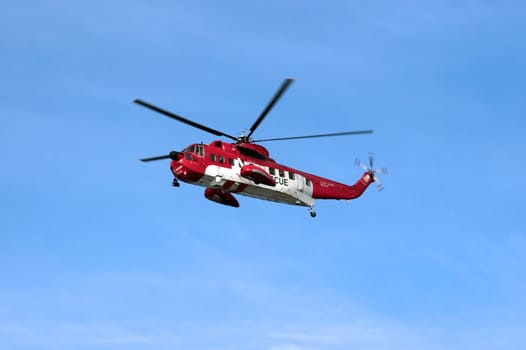 a sea rescue helicopter searching for person  in ballybunion county kerry ireland