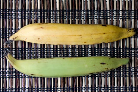 Green and yellow Plantains on placemet