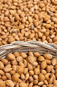 Photo of almonds inside a wicker basket